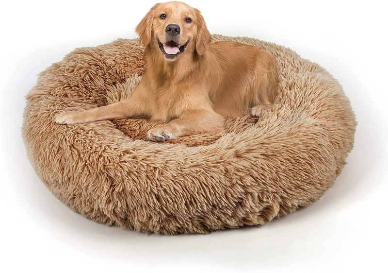 Photo 1 of Dog Bed, Cat Calming Bed, Faux Fur Pillow Pet Donut Cuddler Round Plush Bed for Large Medium Small Dogs and Cats