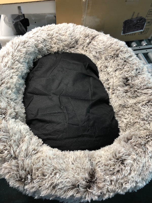 Photo 4 of Dog Bed, Cat Calming Bed, Faux Fur Pillow Pet Donut Cuddler Round Plush Bed for Large Medium Small Dogs and Cats