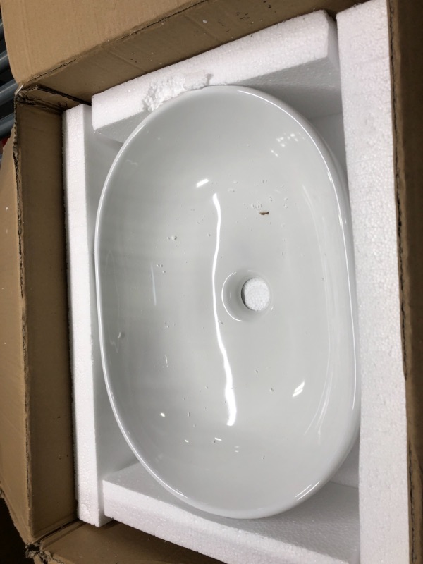 Photo 2 of VESLA HOME Modern Oval 19"x14" White Porcelain Ceramic Above Counter Bathroom Vessel Sink,Ceramic Art Basin Bathroom Sink for Lavatory Vanity Cabinet 19"X14"X5.1"