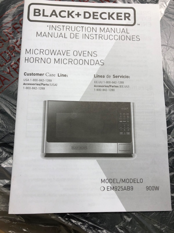 Photo 1 of BLACK+DECKER Digital Microwave Oven with Turntable Push-Button Door, Child Safety Lock, Stainless Steel, 0.9 Cu Ft 0.9 Cu.ft