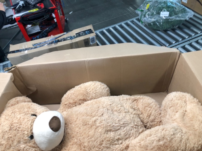 Photo 4 of DOLDOA Big Teddy Bear Stuffed Animals with Footprints Plush Toy for Girlfriend 51 inch (Brown)