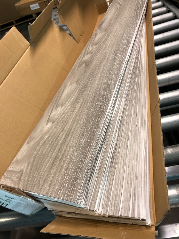 Photo 2 of Art3d Peel and Stick Floor Tile Vinyl Wood Plank 36-Pack 54 Sq.Ft, Light Grey, Rigid Surface Hard Core Easy DIY Self-Adhesive Flooring 36 x 6 x 0.1 inches Light Grey 36
