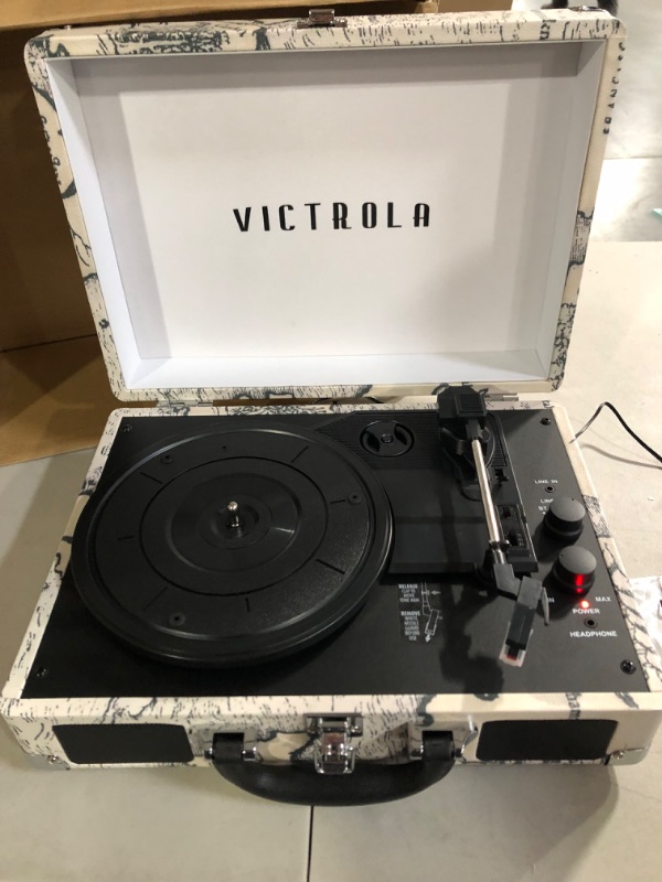 Photo 2 of Victrola Vintage 3-Speed Bluetooth Portable Suitcase Record Player with Built-in Speakers | Upgraded Turntable Audio Sound & Vintage Vinyl Record Storage Carrying Case for 30+ Records, Retro Map