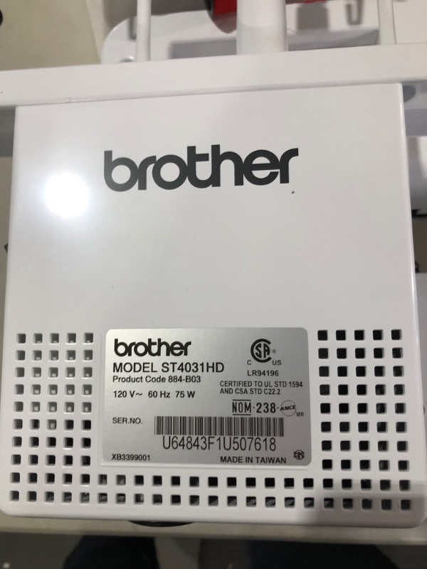 Photo 1 of Brother ST4031HD Serger, Strong & Tough Serger, 1,300 Stitches Per Minute, Durable Metal Frame Overlock Machine, Large Extension Table, 3 Included Accessory Feet
