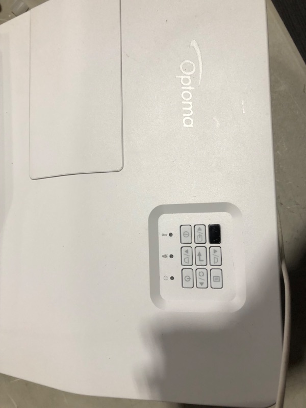 Photo 1 of Optoma GT5600 Ultra Short Throw Gaming and Movie Projector, 3600 Lumens for Ambient Lighting, Easy Setup with Auto Keystone, 100-in Image from Only a Few Inches Away