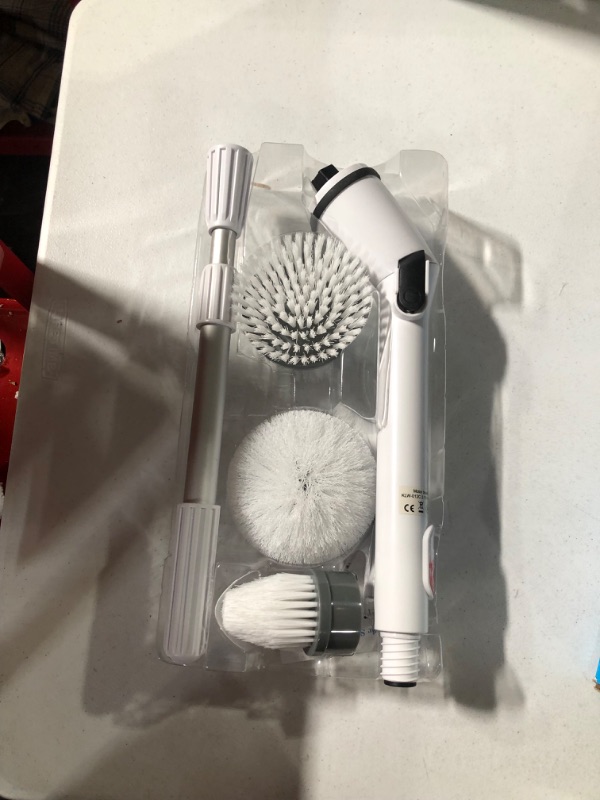 Photo 2 of  Electric Spin Scrubber  Pro, Cordless Spin Scrubber with 4 Replaceable Brush Heads- (White)