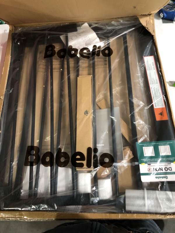 Photo 1 of BABELIO 26-40 Inch Easy Install Extra Wide Pressure Mounted Metal Baby Gate, No Drilling, No Tools Required, with Wall Protectors and Extenders (Black) Black 26-40 Inch (Pack of 1)