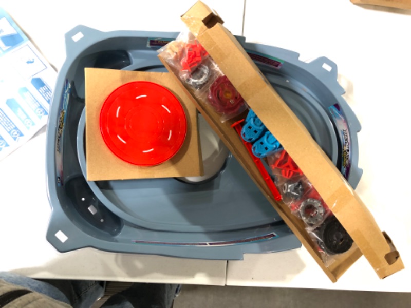 Photo 2 of BEYBLADE Burst Surge Speedstorm Motor Strike Battle Set -- Battle Game playset with Motorized Stadium, 2 Battling Top Toys and 2 Launchers