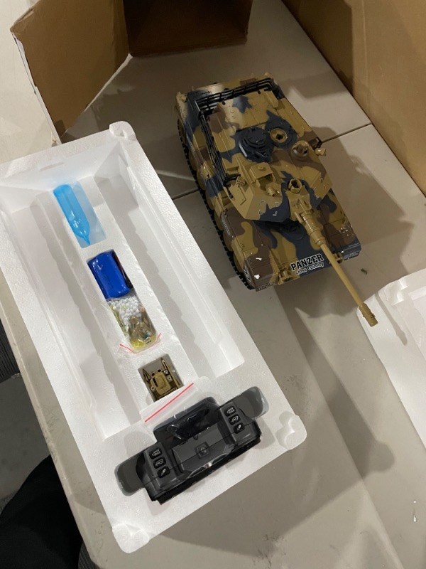 Photo 2 of fisca 1/18 Remote Control Tank 2.4Ghz, 15 Channel M1A2 RC Tank with Smoking and Vibration Controller - Abrams Main Battle Tank That Shoot BBS Airsoft Bullets Military