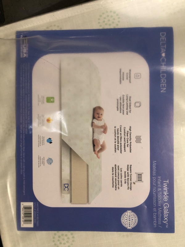 Photo 3 of Delta Children Twinkle Galaxy Dual Sided Crib and Toddler Mattress - Premium Sustainably Sourced Fiber Core - Waterproof