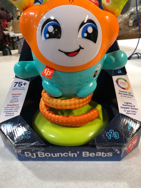 Photo 5 of Fisher-Price Interactive Baby and Toddler Learning Toy with Music, Lights and Bouncing Action, DJ Bouncin’ Beats ?