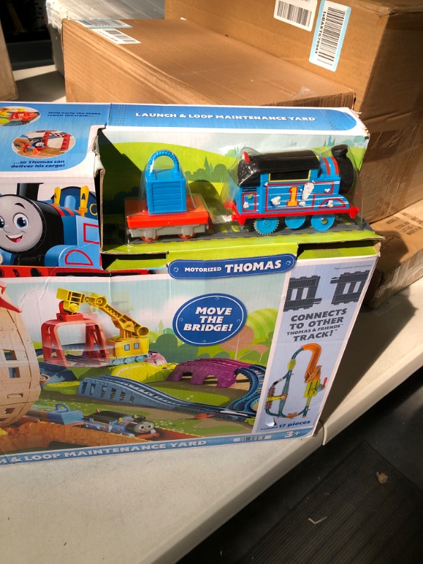 Photo 3 of Fisher-Price Thomas and Friends Train Set with Loop the Loop Action, Thomas Motorized Toy Train, Carly the Crane, Maintenance Yard? Standard Launch & Loop Set