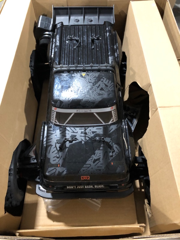 Photo 4 of ARRMA RC Truck 1/8 Outcast 6S BLX 4WD Extreme Bash Stunt Truck RTR (Battery and Charger Not Included), Black, ARA8710