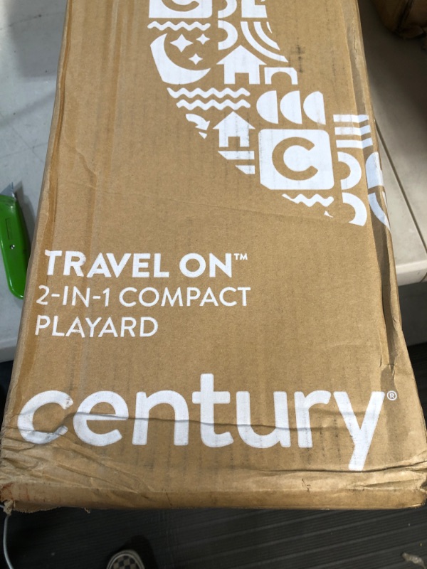 Photo 1 of Century Travel On 2-in-1 Compact Playard with Bassinet, Playpen with Sheet Included, Metro