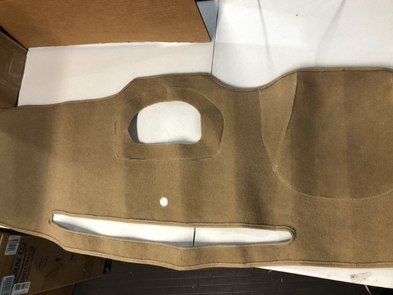 Photo 1 of Coverking Custom Fit Dashboard Cover for Select Toyota Tundra Models - Poly Carpet (Beige) with Center Sensor Cut-Out; without Center Speaker Cut-Out Beige