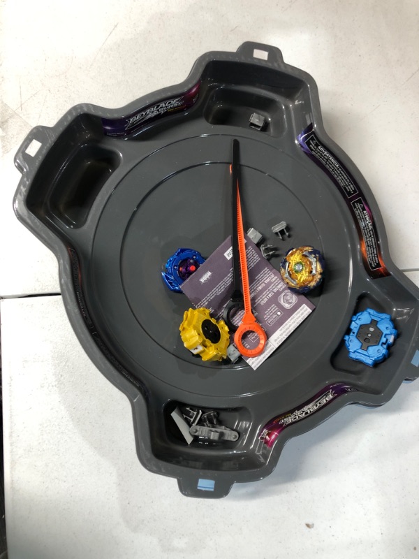 Photo 2 of BEYBLADE Burst Pro Series Evo Elite Champions Pro Set -- Complete Battle Game Set with Beystadium, 2 Battling Top Toys and 2 Launchers Frustration-Free Packaging