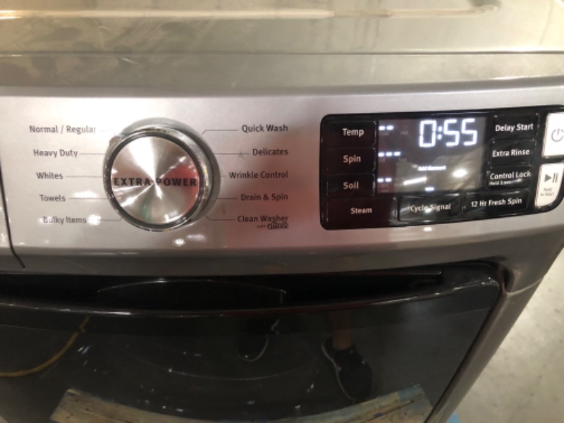 Photo 1 of **TESTED** DAMAGED TRAY Maytag 4.5-cu ft High Efficiency Stackable Steam Cycle Front-Load Washer (Metallic Slate)