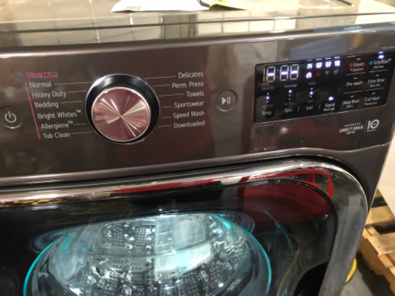 Photo 1 of **TESTED POWERS ON**  LIKE NEW  LG 5.2 cu. ft. Mega Capacity Smart wi-fi Enabled Front Load Washer with TurboWash® and Built-In Intelligence