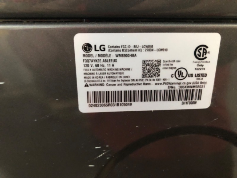 Photo 1 of **TESTED POWERS ON**  LIKE NEW  LG 5.2 cu. ft. Mega Capacity Smart wi-fi Enabled Front Load Washer with TurboWash® and Built-In Intelligence