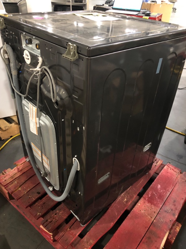 Photo 1 of **TESTED POWERS ON**  LIKE NEW  LG 5.2 cu. ft. Mega Capacity Smart wi-fi Enabled Front Load Washer with TurboWash® and Built-In Intelligence