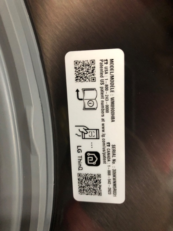 Photo 1 of **TESTED POWERS ON**  LIKE NEW  LG 5.2 cu. ft. Mega Capacity Smart wi-fi Enabled Front Load Washer with TurboWash® and Built-In Intelligence