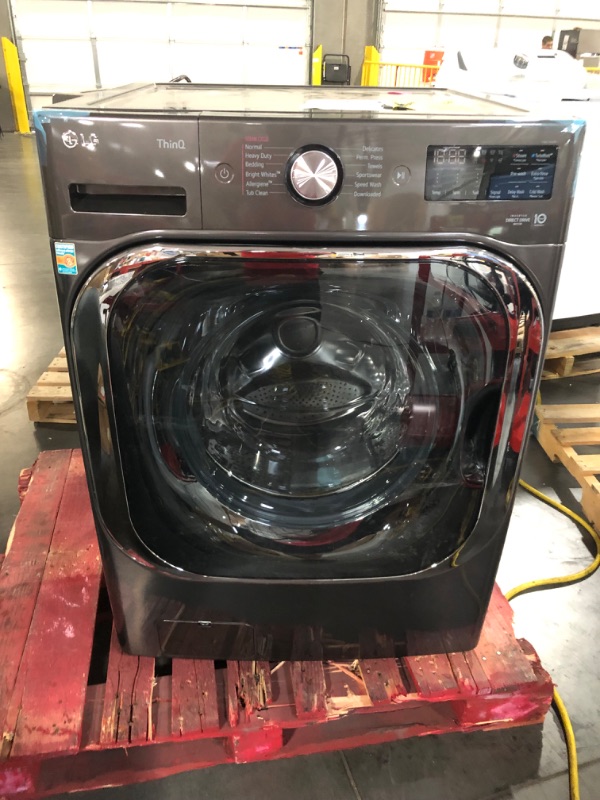 Photo 1 of **TESTED POWERS ON**  LIKE NEW  LG 5.2 cu. ft. Mega Capacity Smart wi-fi Enabled Front Load Washer with TurboWash® and Built-In Intelligence
