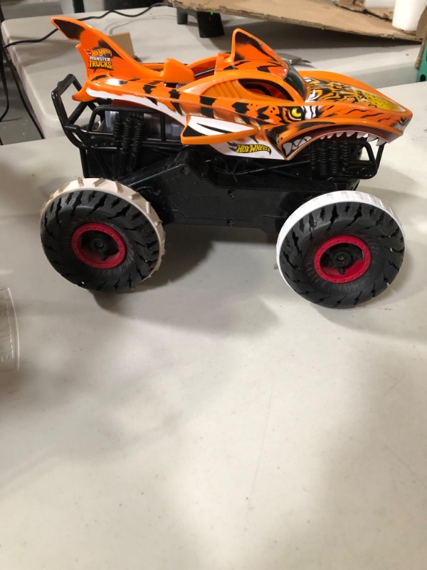 Photo 4 of **USED**Hot Wheels Monster Trucks, Remote Control Car, Monster Truck Toy with All-Terrain Wheels, 1:15 Scale Unstoppable Tiger Shark RC