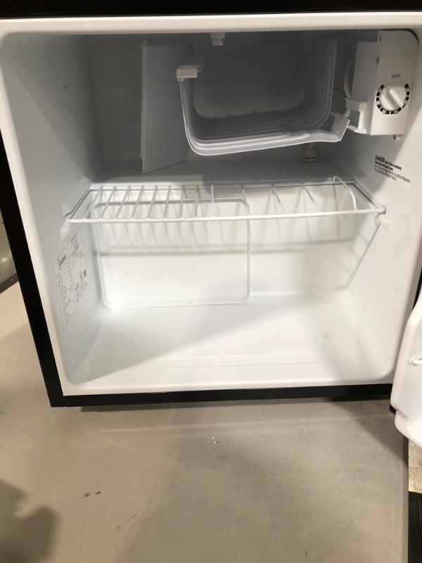Photo 5 of **USED, SEE NOTES**Midea WHS-65LB1 Compact Single Reversible Door Refrigerator, 1.6 Cubic Feet(0.045 Cubic Meter), Black Black 1.6 Cubic Feet Refrigerator