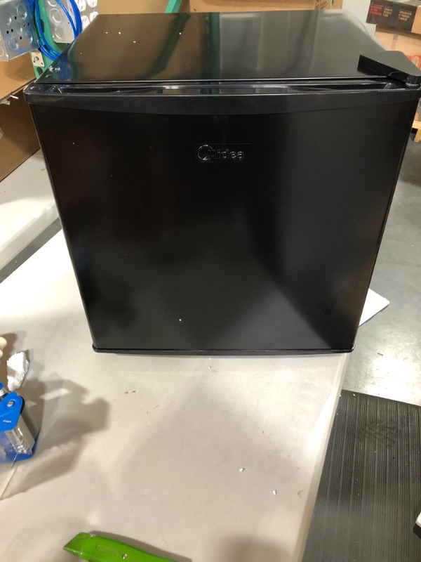 Photo 3 of **USED, SEE NOTES**Midea WHS-65LB1 Compact Single Reversible Door Refrigerator, 1.6 Cubic Feet(0.045 Cubic Meter), Black Black 1.6 Cubic Feet Refrigerator