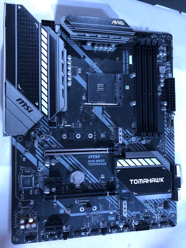 Photo 2 of MSI MAG B550 TOMAHAWK Gaming Motherboard (AMD AM4, DDR4, PCIe 4.0, SATA 6Gb/s, M.2, USB 3.2 Gen 2, HDMI/DP, ATX, AMD Ryzen 5000 Series processors)