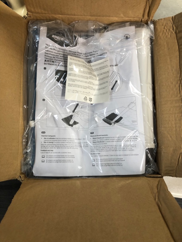 Photo 1 of **NEW** Amazon Basics Vacuum Compression Storage Bags with Hand Pump - Large, 5-Pack