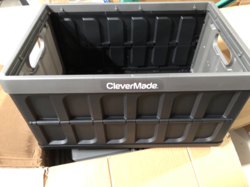 Photo 2 of **SEE NOTES**
CleverMade 46L Collapsible Storage Bins with Lids - Folding Plastic Stackable Utility Crates, Solid Wall 3 Pack, Charcoal 46 Liters Charcoal