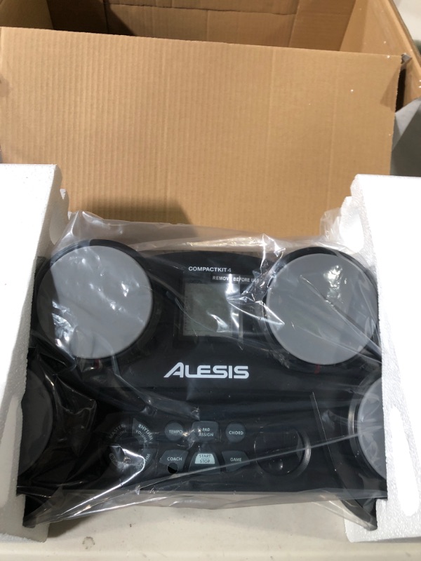 Photo 3 of Alesis Compact Kit 4 – Tabletop Electric Drum Set with 70 Electronic / Acoustic Drum Kit Sounds, 4 Pads,