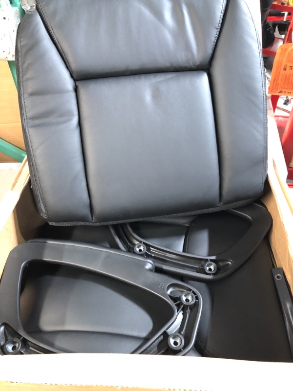 Photo 2 of Amazon Basics Classic Puresoft Padded Mid-Back Office chair.