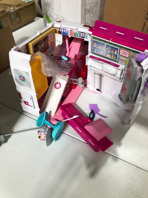 Photo 2 of ???Barbie Playset with 20+ Accessories, Emergency Vehi??cle Transforms into 2+ Foot Hospital with Lights and Sounds, Care Clinic???????? Standard