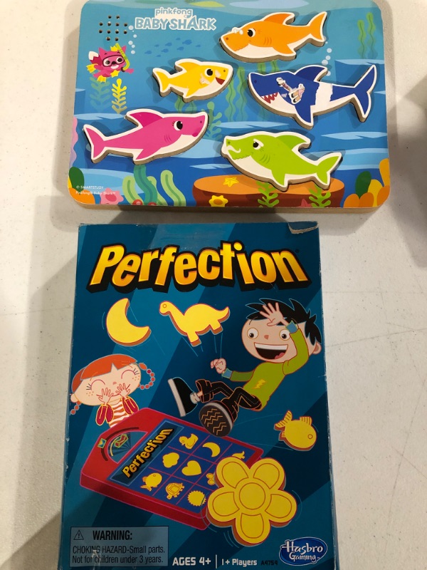 Photo 2 of Bundle: Hasbro Gaming Perfection and Baby Shark puzzle