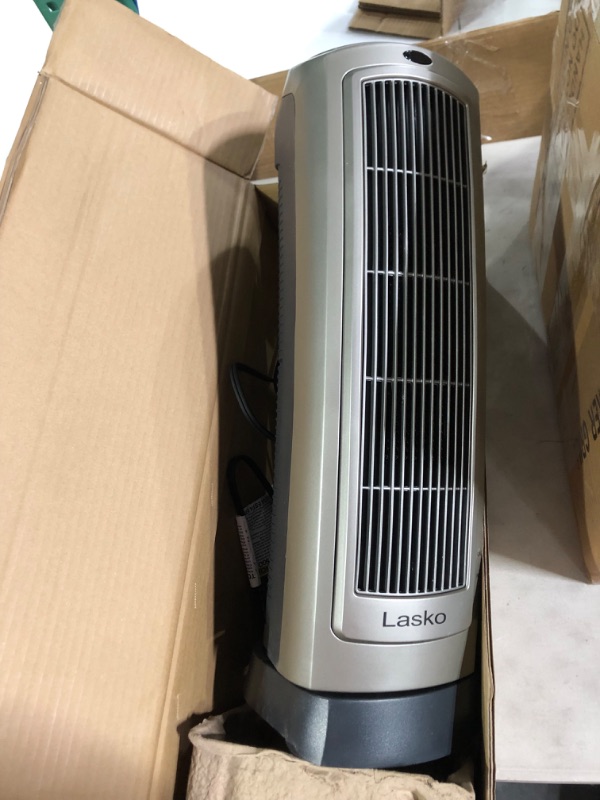 Photo 1 of Lasko Oscillating Digital Ceramic Tower Heater for Home with Adjustable Thermostat, Timer and Remote Control, 23 Inches, 1500W, Silver, 755320