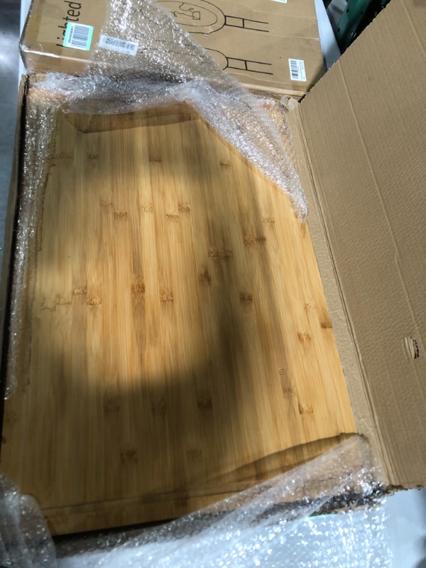 Photo 2 of  Extra Large Cutting Board, Turkey Carving Board Bamboo Meat Cutting Boards for Kitchen with Juice Groove and Handles Heavy Duty Charcuterie Board