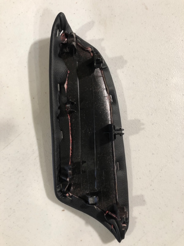 Photo 2 of Arm rest car part. unable to verify part and vehicle part is from.