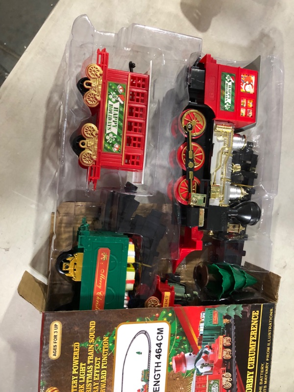 Photo 2 of Christmas Train Set, Electric Train Around Tree w/ Smoke Light & Sound for Kids Train Toy, Steam Locomotive Engine, Cargo Car and Train Tracks
