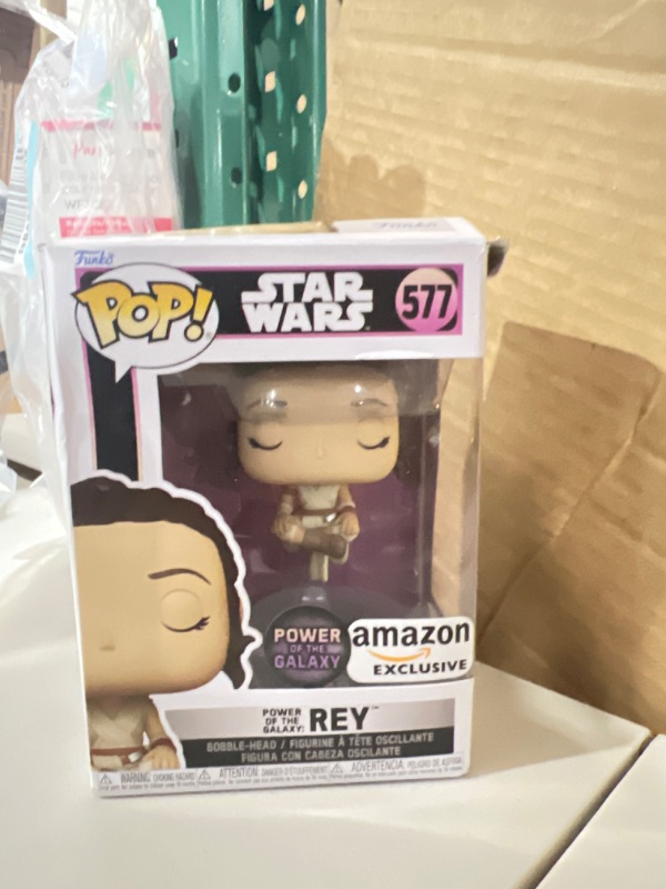 Photo 2 of Funko Pop! Star Wars: Power of The Galaxy - Rey, Amazon Exclusive