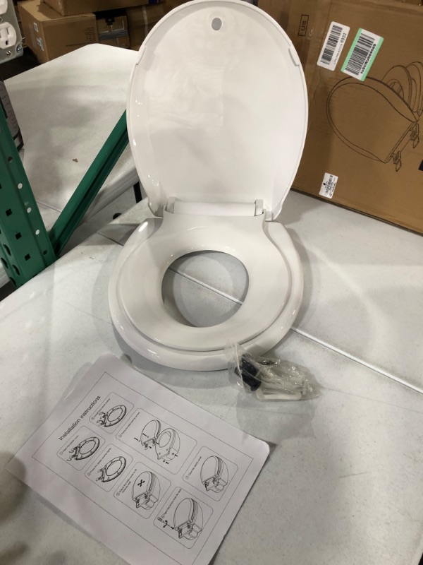 Photo 2 of *USED* Round Toilet Seat With Toddler Seat Built In, Slow Close, Magnetic Toddler Seat, White(16.5”Round)