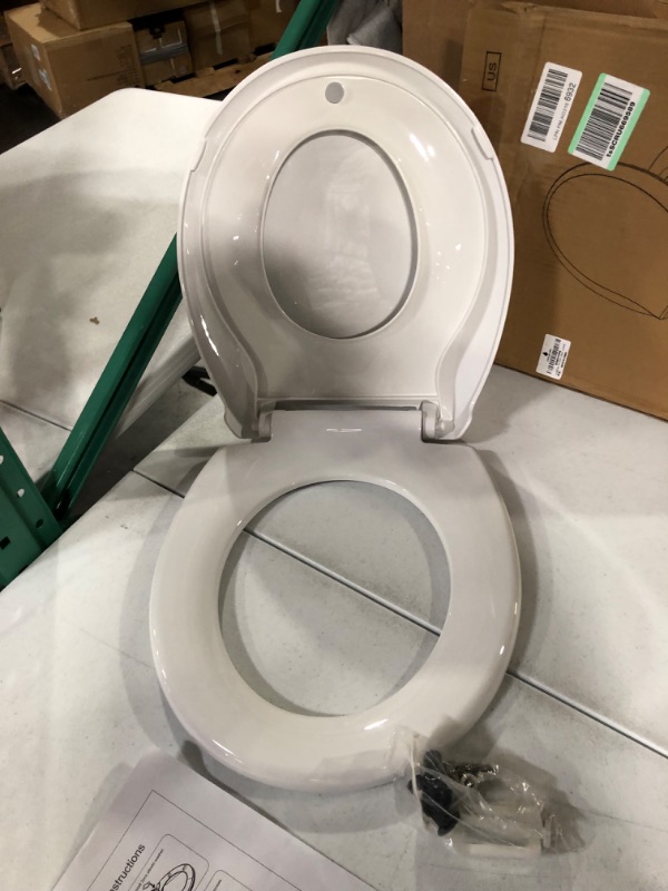 Photo 4 of *USED* Round Toilet Seat With Toddler Seat Built In, Slow Close, Magnetic Toddler Seat, White(16.5”Round)