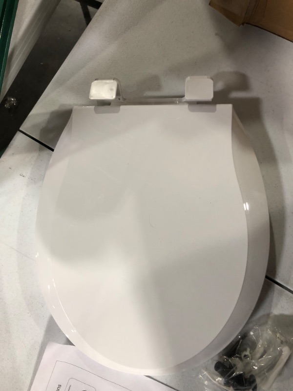 Photo 3 of *USED* Round Toilet Seat With Toddler Seat Built In, Slow Close, Magnetic Toddler Seat, White(16.5”Round)