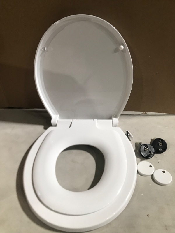 Photo 2 of Delta -Faucet Sanborne Slow Close Round Toilet Seat with Built In Child Seat, Nightlight Toilet Seat, Soft Close Toilet Seat Round, Toilet Seat Slow Close, White 823902-N-WH With Nightlight & Potty Seat Slow Close