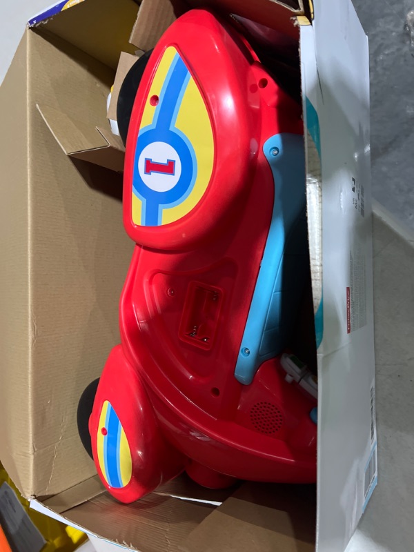 Photo 2 of Fisher-Price Laugh & Learn Smart Stages Scooter