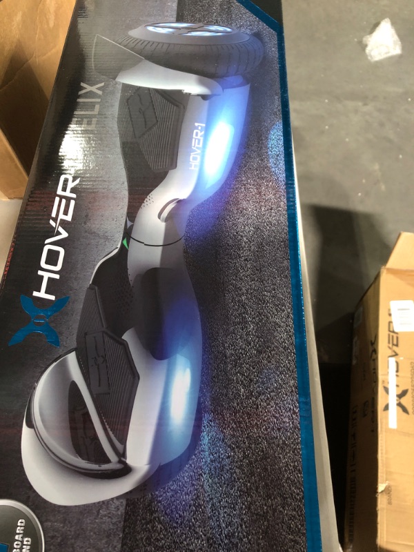 Photo 2 of  SEE NOTES***
Helix Electric Hoverboard | 7MPH Top Speed, 4 Mile Range Gun Metal color