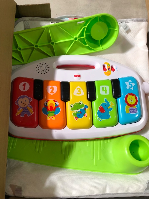 Photo 2 of Fisher-Price Deluxe Kick 'n Play Piano Gym, Green