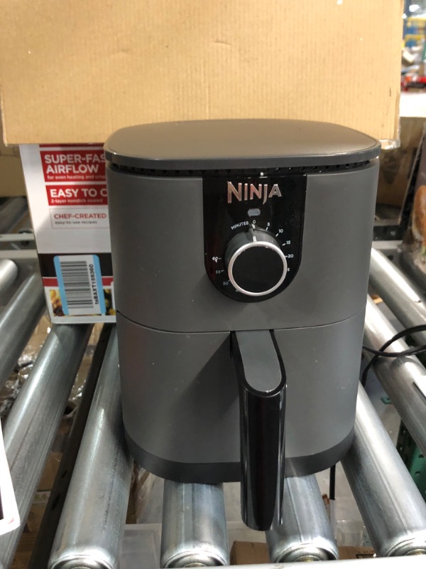 Photo 2 of * used * plugged in works *
Ninja AF080 Mini Air Fryer, 2 Quarts Capacity, Compact, Nonstick, with Quick Set Timer, Grey
