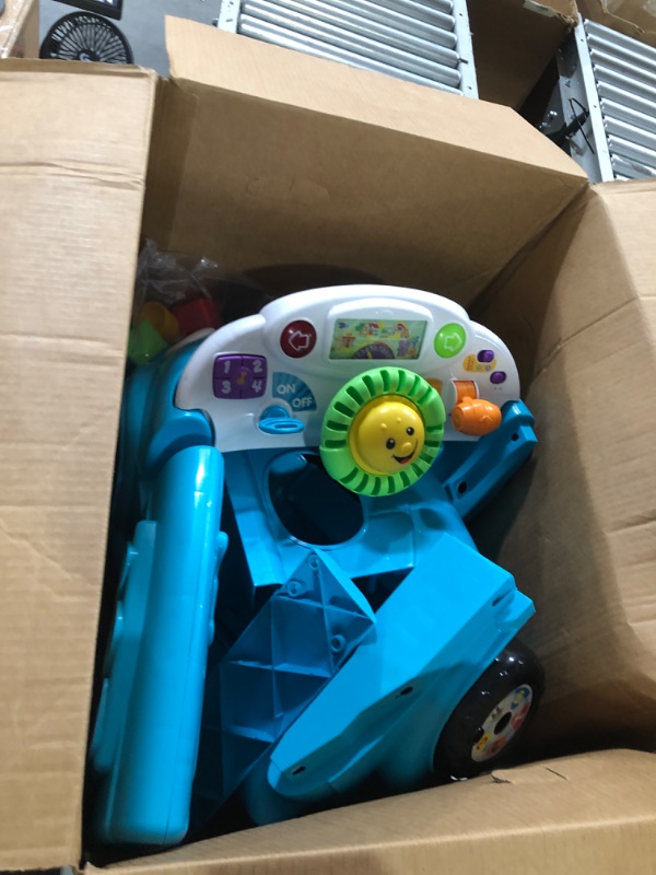 Photo 2 of Fisher-Price Laugh & Learn Crawl Around Car, Blue interactive play center